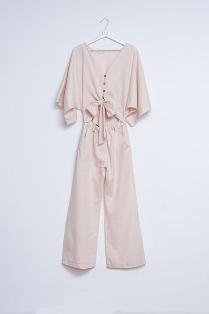Q2 Mono largo de lino beige con lazada en la cintura