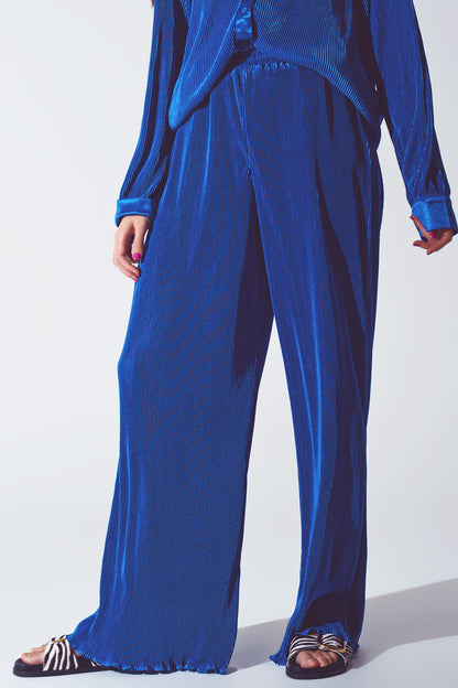 Pantalón ancho plisado de satén azul
