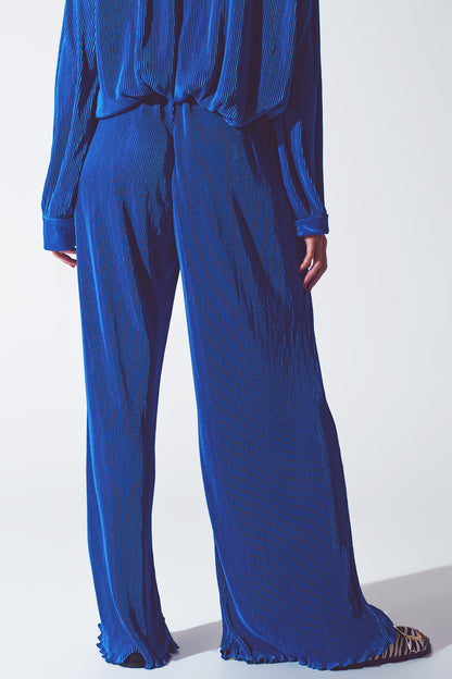 Pantalón ancho plisado de satén azul