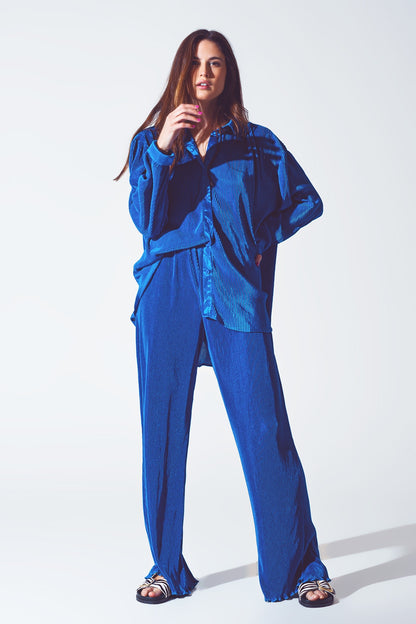 Pantalón ancho plisado de satén azul