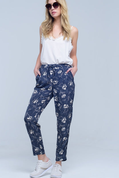 Pantalón azul marino con estampado floral
