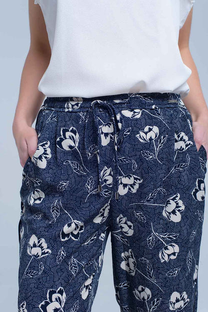 Pantalón azul marino con estampado floral