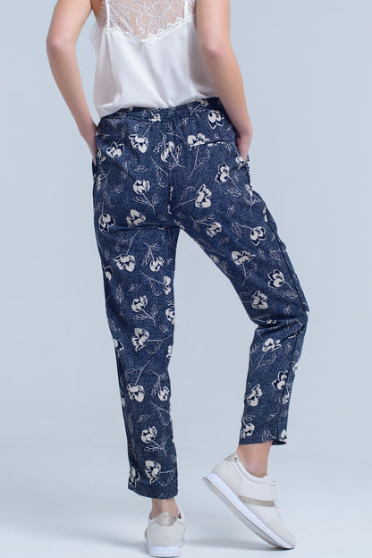 Pantalón azul marino con estampado floral