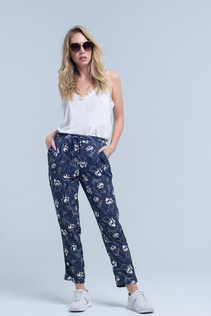 Pantalón azul marino con estampado floral
