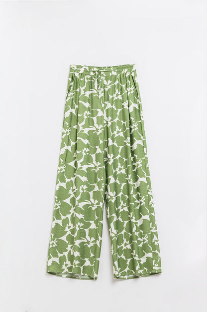 Pantalón con cintura elástica y estampado floral verde