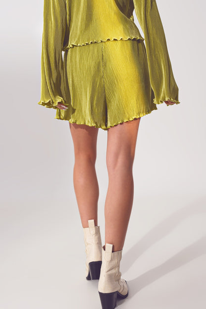 Pantalón corto plisado en verde