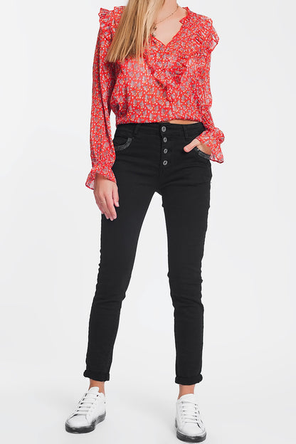 Pantalon negro boyfriend con detalles en bolsillo de lentejuelas