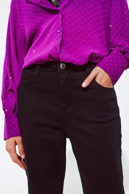 Pantalón negro holgado de algodón de tiro medio