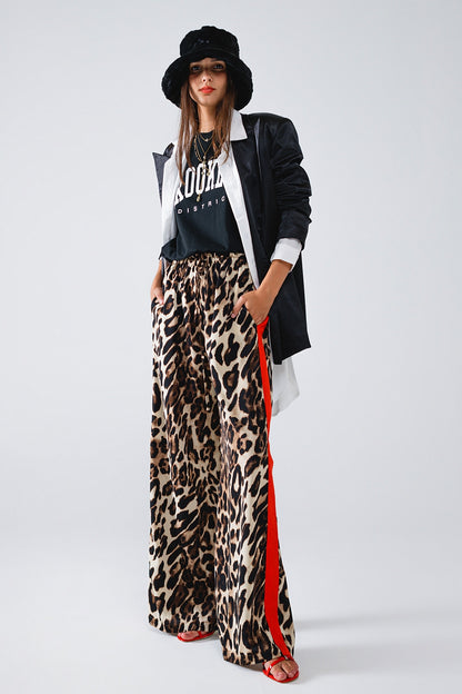 Pantalón recto de leopardo con rayas rojas laterales