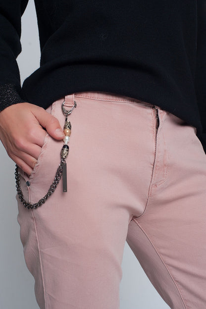 Pantalón utilitario con puños y cadena en rosa