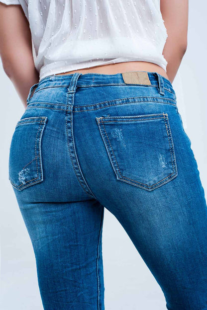 Pantalon vaquero ajustado elastico con rasgaduras