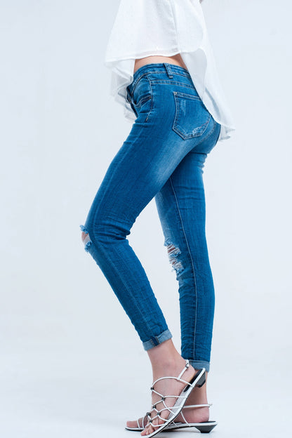 Pantalon vaquero ajustado elastico con rasgaduras