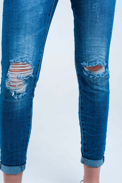 Pantalon vaquero ajustado elastico con rasgaduras