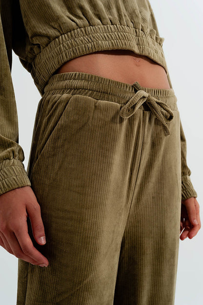 Pantalon verde con cordón ajustable de pana