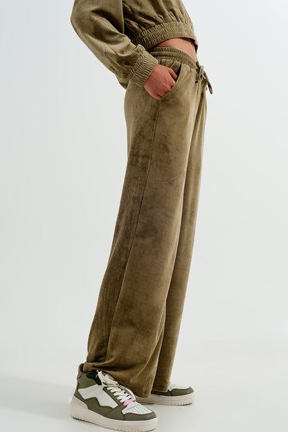 Pantalon verde con cordón ajustable de pana