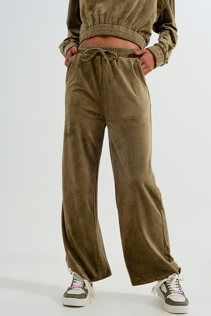 Pantalon verde con cordón ajustable de pana