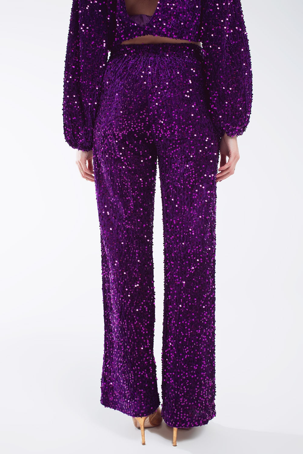 Pantalones anchos de lentejuelas con bolsillos laterales en morado