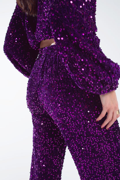 Pantalones anchos de lentejuelas con bolsillos laterales en morado