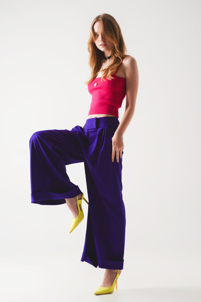 Pantalones anchos plisados de color morado