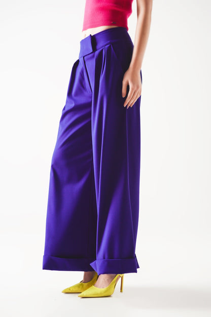 Pantalones anchos plisados de color morado
