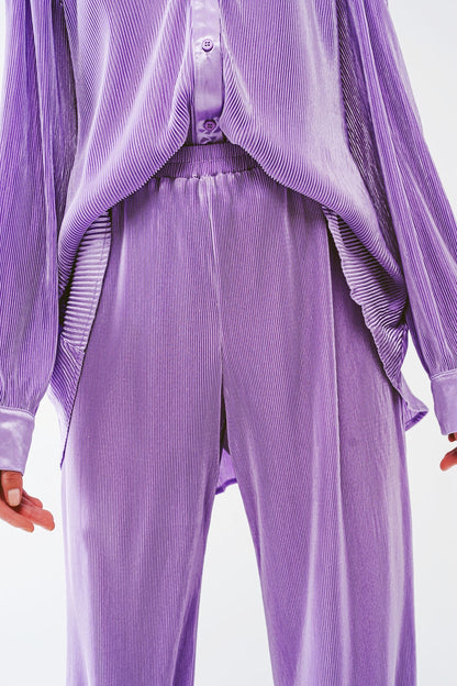 Pantalones anchos plisados de satén en lila