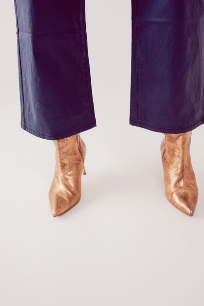 Pantalones azules  de pernera ancha de cuero sintético