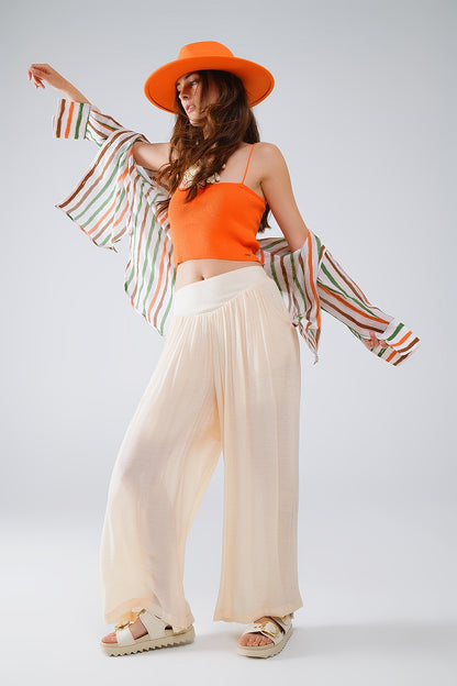 Pantalones Beige Estilo Palazzo Con Bolsillos Laterales Y Cintura Gruesa