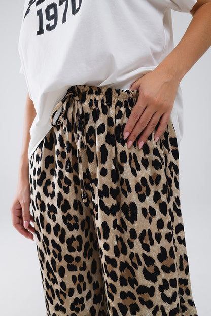 Pantalones con estampado de leopardo cordón y bolsillos