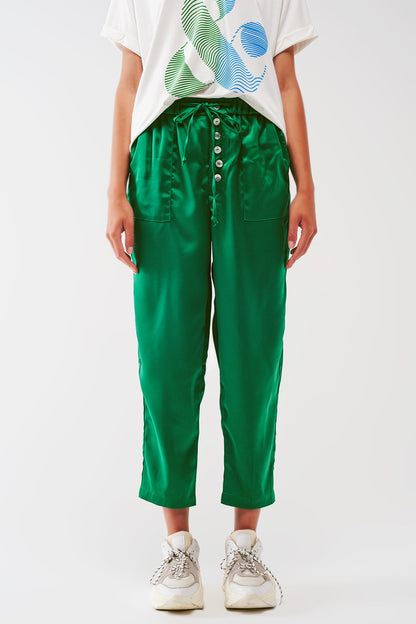 Pantalones cortos de satén en verde