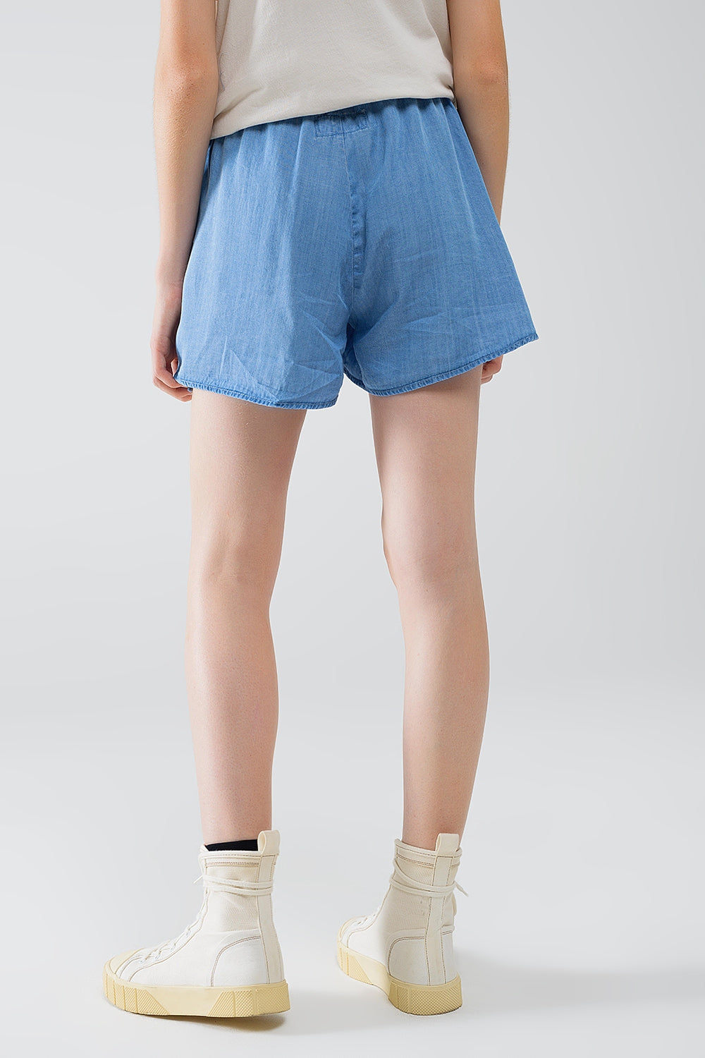Pantalones cortos de Tencel vaqueros fluidos con bolsillos laterales