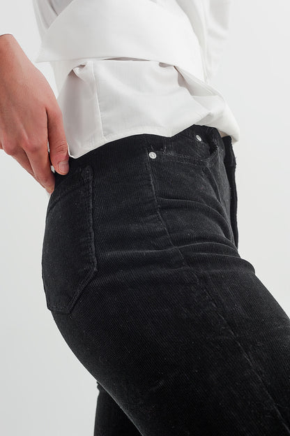 Pantalones de campana negros de pana elástica