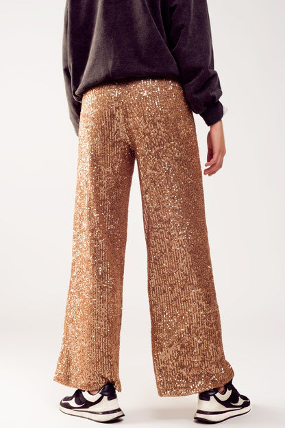 Pantalones de lentejuelas en oro