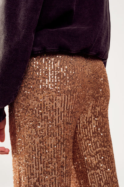 Pantalones de lentejuelas en oro
