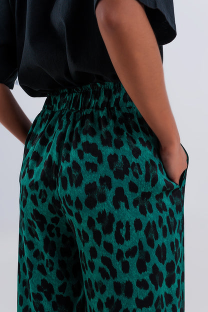 Pantalones de pernera ancha con estampado de leopardo en verde