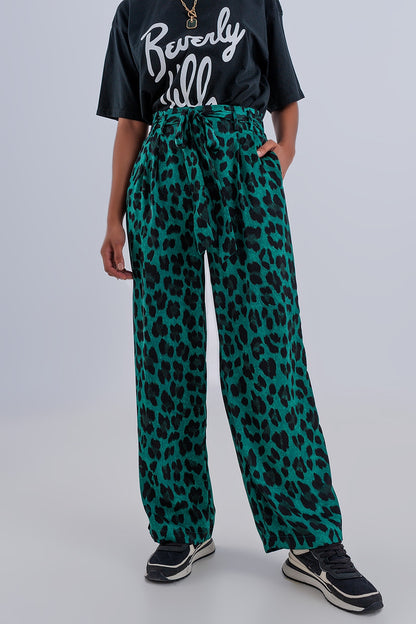 Pantalones de pernera ancha con estampado de leopardo en verde