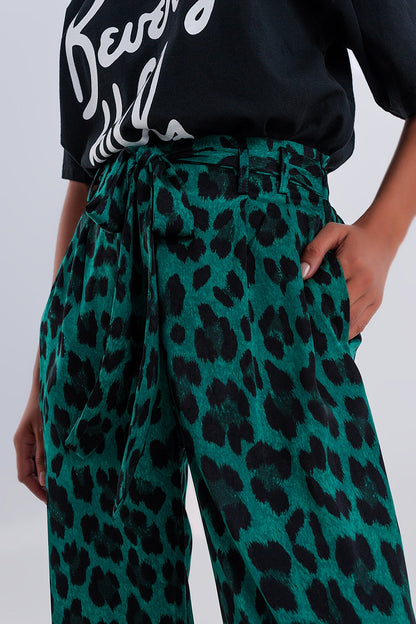 Pantalones de pernera ancha con estampado de leopardo en verde