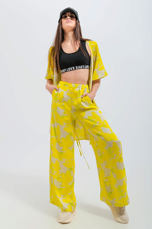 Q2 Pantalones de pernera ancha con estampado floral amarillo