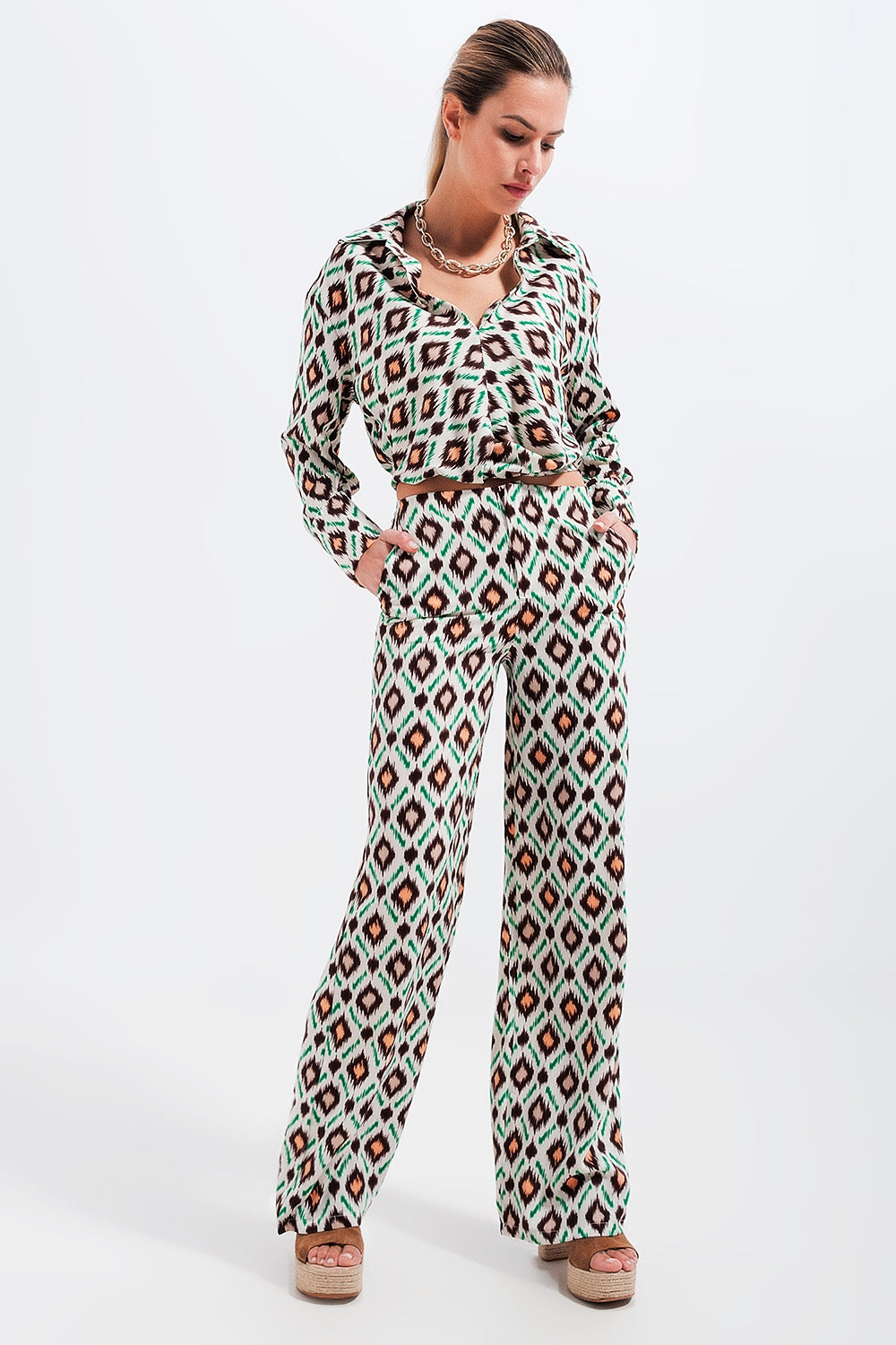 Pantalones de pernera ancha con estampado geométrico