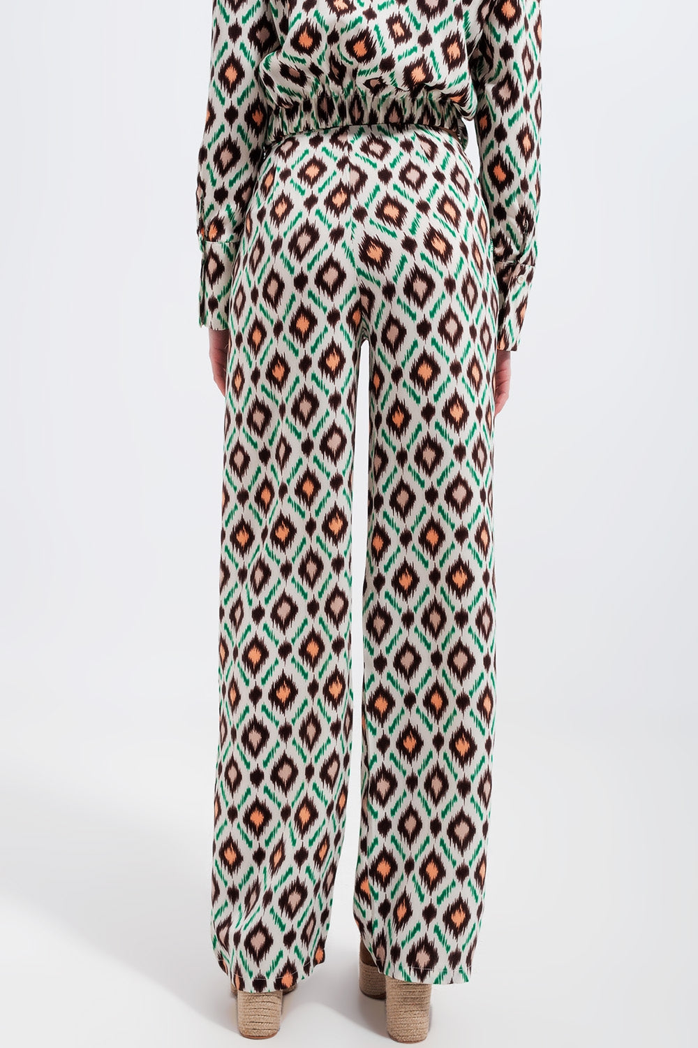 Pantalones de pernera ancha con estampado geométrico