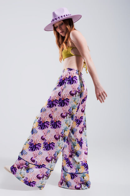Pantalones de pernera ancha y talle alto con estampado floral morado de satén