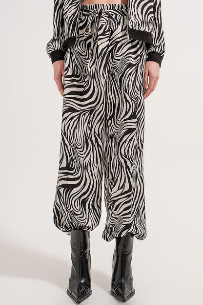 Pantalones de pernera muy ancha con estampado de cebra