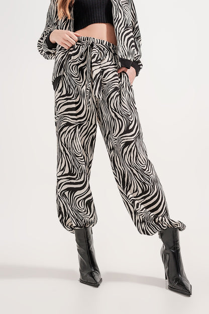 Pantalones de pernera muy ancha con estampado de cebra