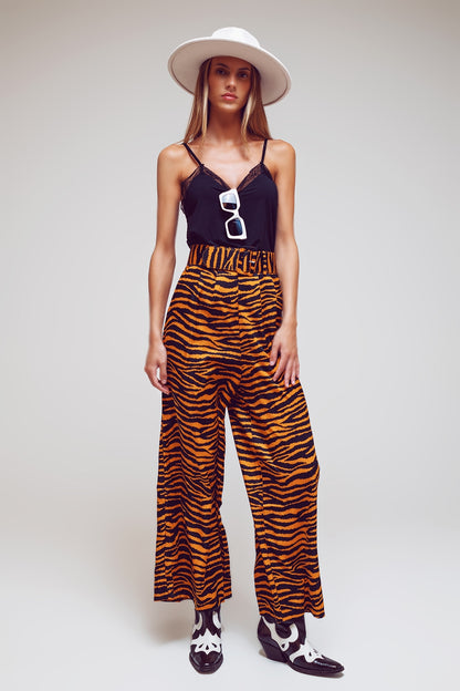 Pantalones de pierna recta con estampado animal y cinturón ancho con hebilla