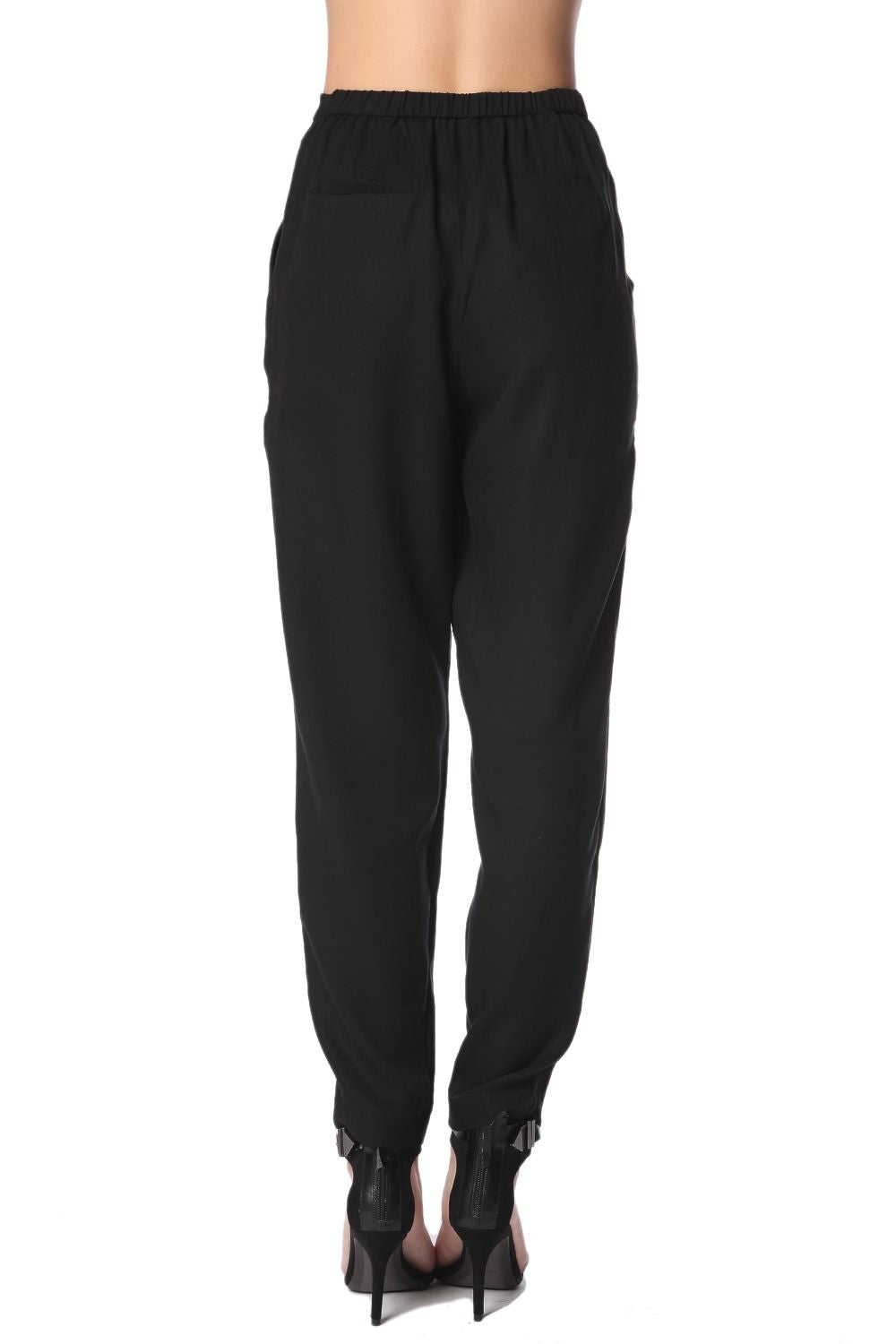 Pantalones de punto negro con pinzas con parte delantera cruzada
