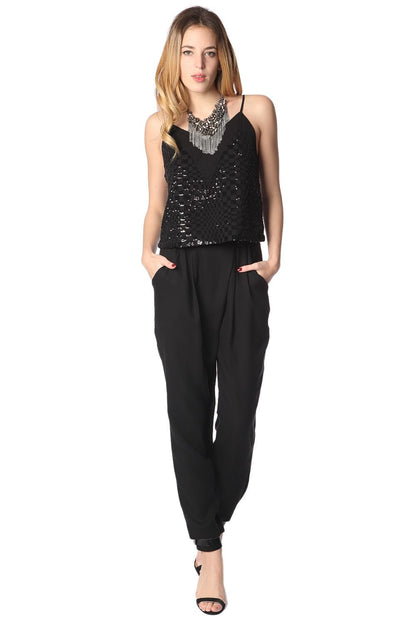 Pantalones de punto negro con pinzas con parte delantera cruzada