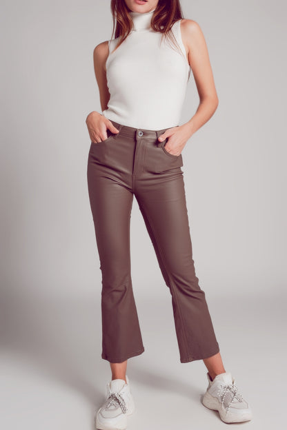 Pantalones elásticos de piel sintética en beige