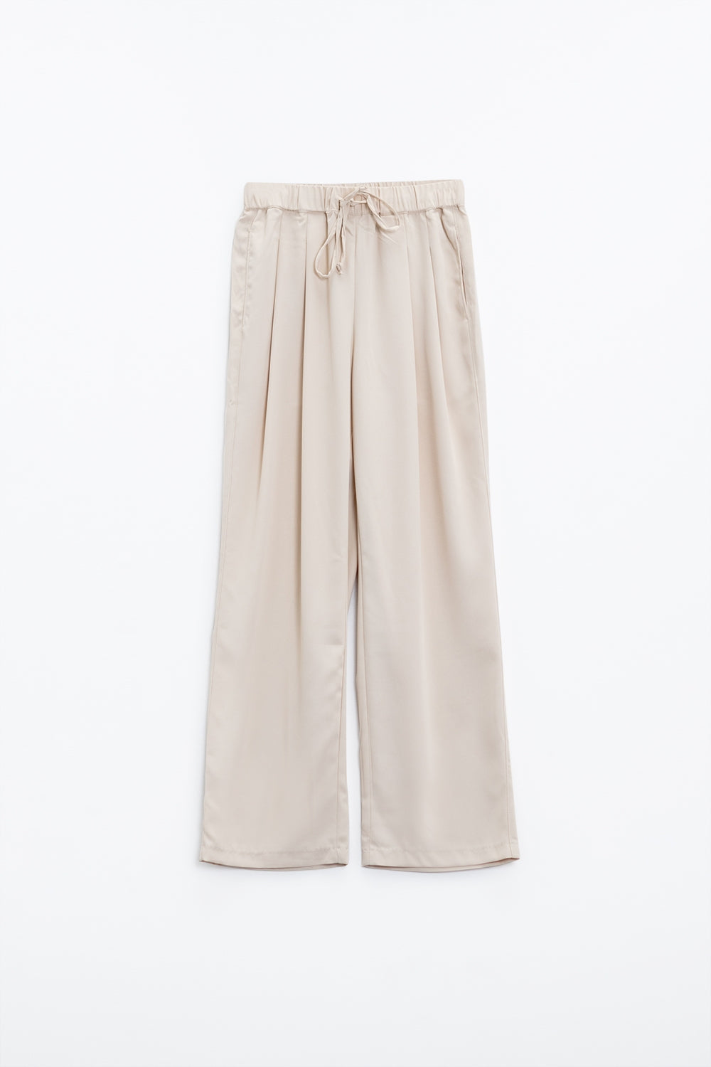 Pantalones En beige Con Bolsillos Delanteros Y Cierre De Cordón
