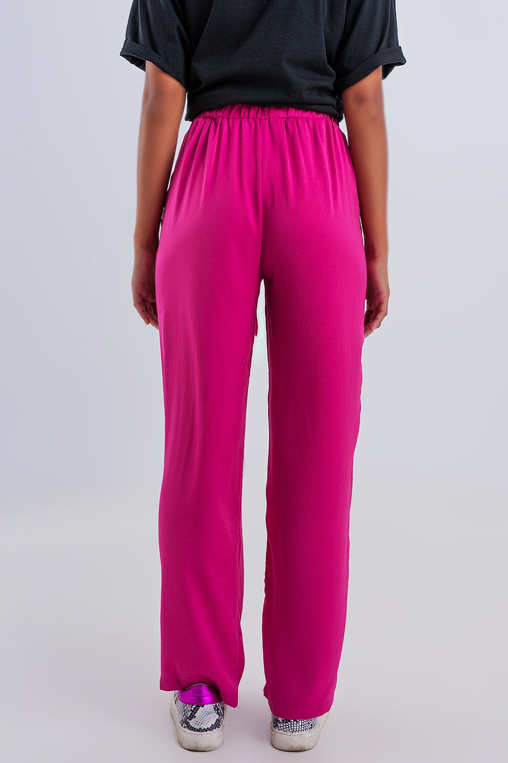 Pantalones fucsia de pernera ancha con cinturón