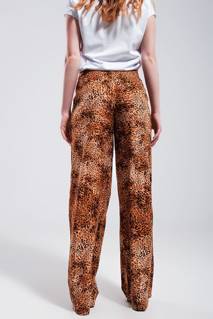 Pantalones marrones de pernera ancha  con estampado de leopardo de tejido ligero