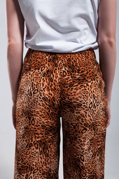 Pantalones marrones de pernera ancha  con estampado de leopardo de tejido ligero